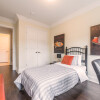 335 Dunsdon Staged model suite Bedroom facing closet