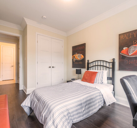335 Dunsdon Staged model suite Bedroom facing closet