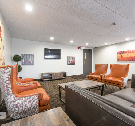 621 627 631 MacDonald Social room seating area2