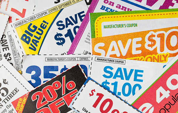 A large stack of money-saving coupons.