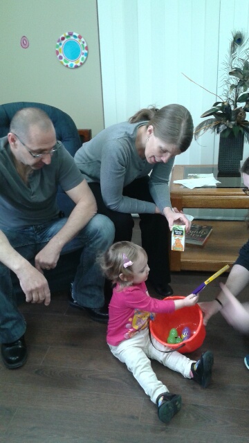 Little Hannah with grandparents