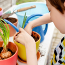 March 2022 Blog Image 3 Kid potting plants