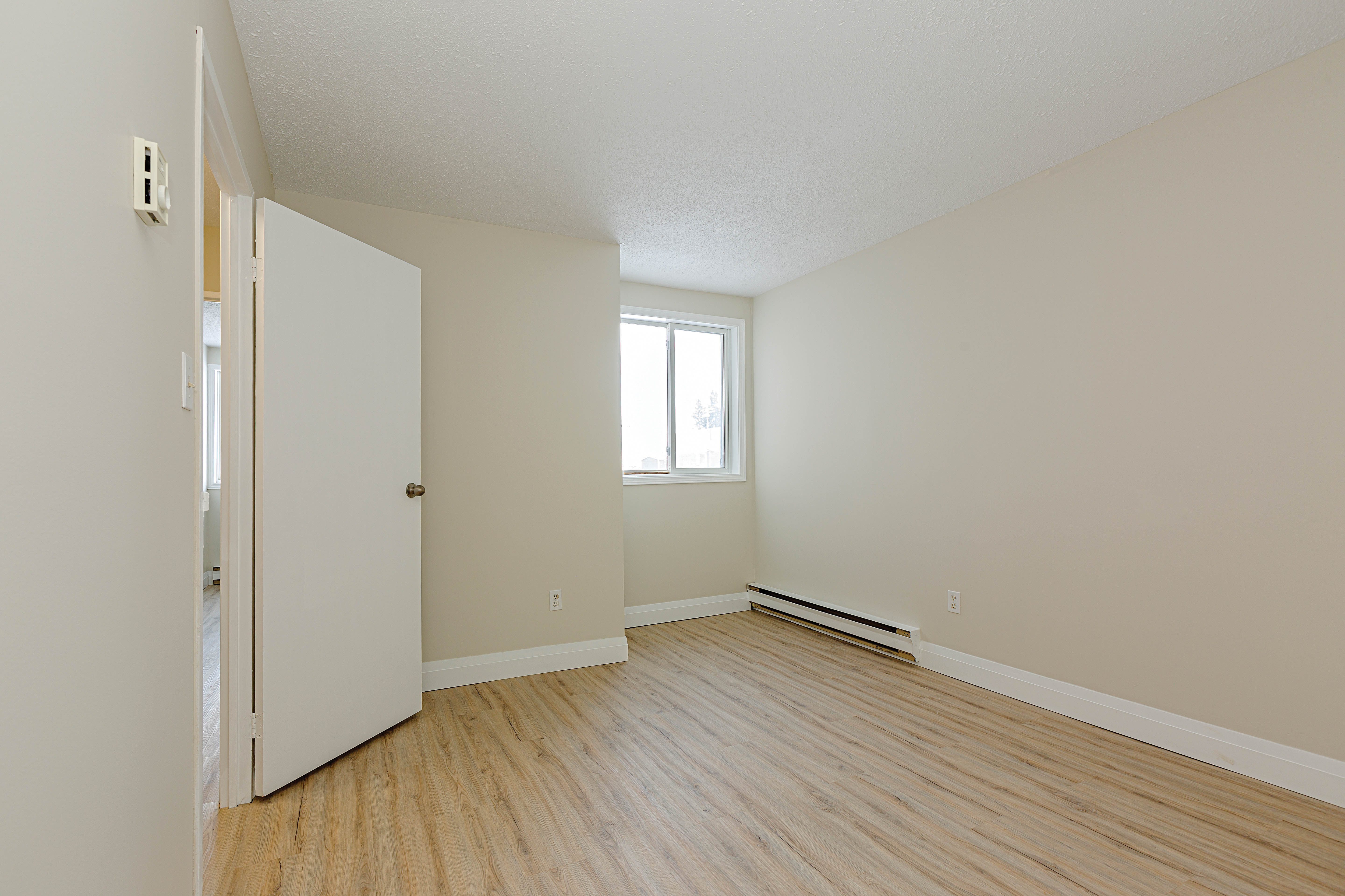 SkyLiving RiversideApartments 1214RiversideDR Timmins Unit111 TwoBed OneBath 0010 bedroom2